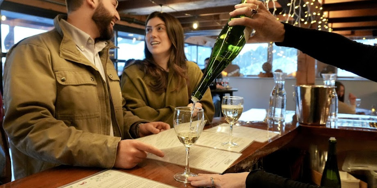 Guests enjoying themselves at the tasting bar.